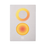 notebook with circle gradient patterns in yellow aura.